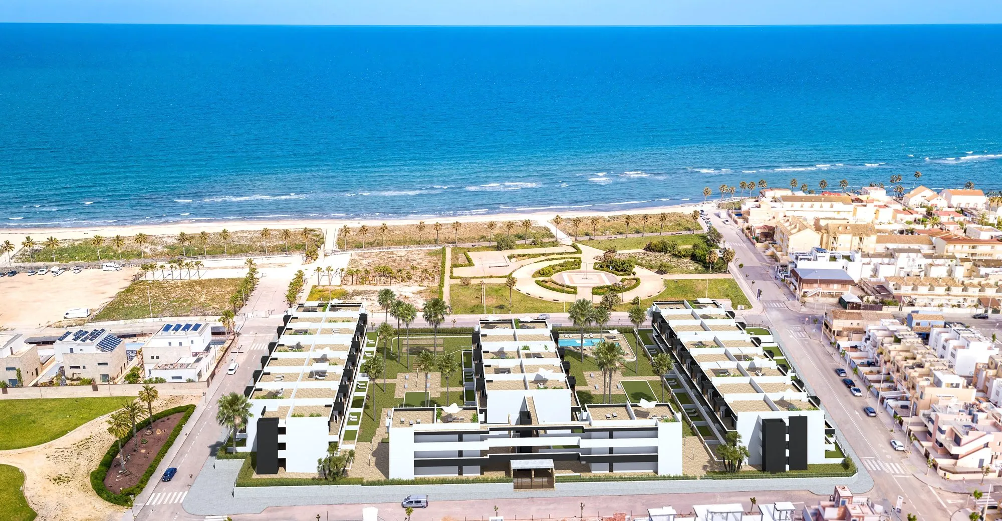 Aerial render of Las Higuericas: three blocks with gardens and a pool, facing the park, the beach and the sea