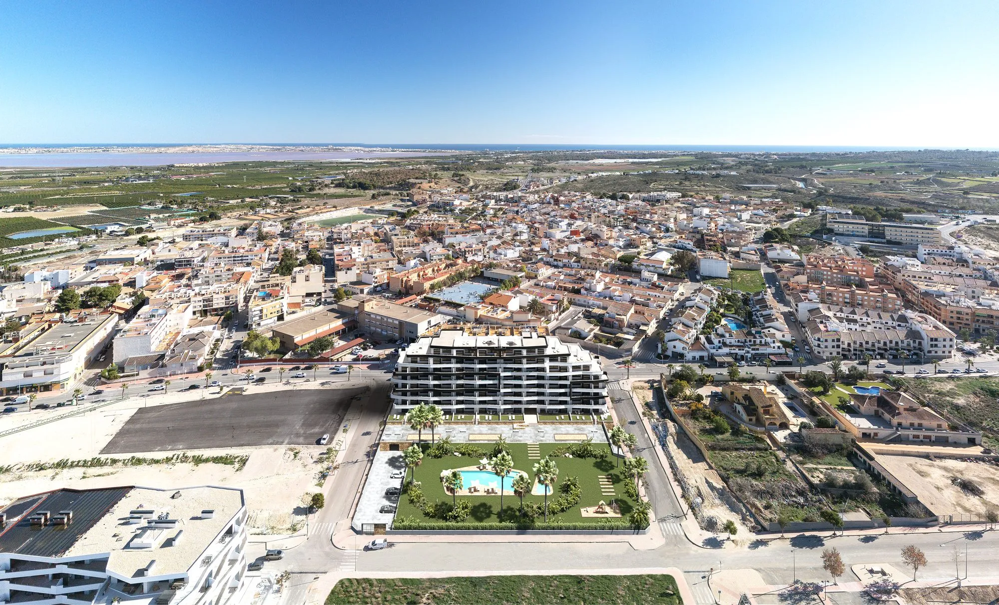 Aerial render of Duly San Miguel in San Miguel de Salinas, with the pool garden in front and the Torrevieja salt lakes and the sea on the horizon