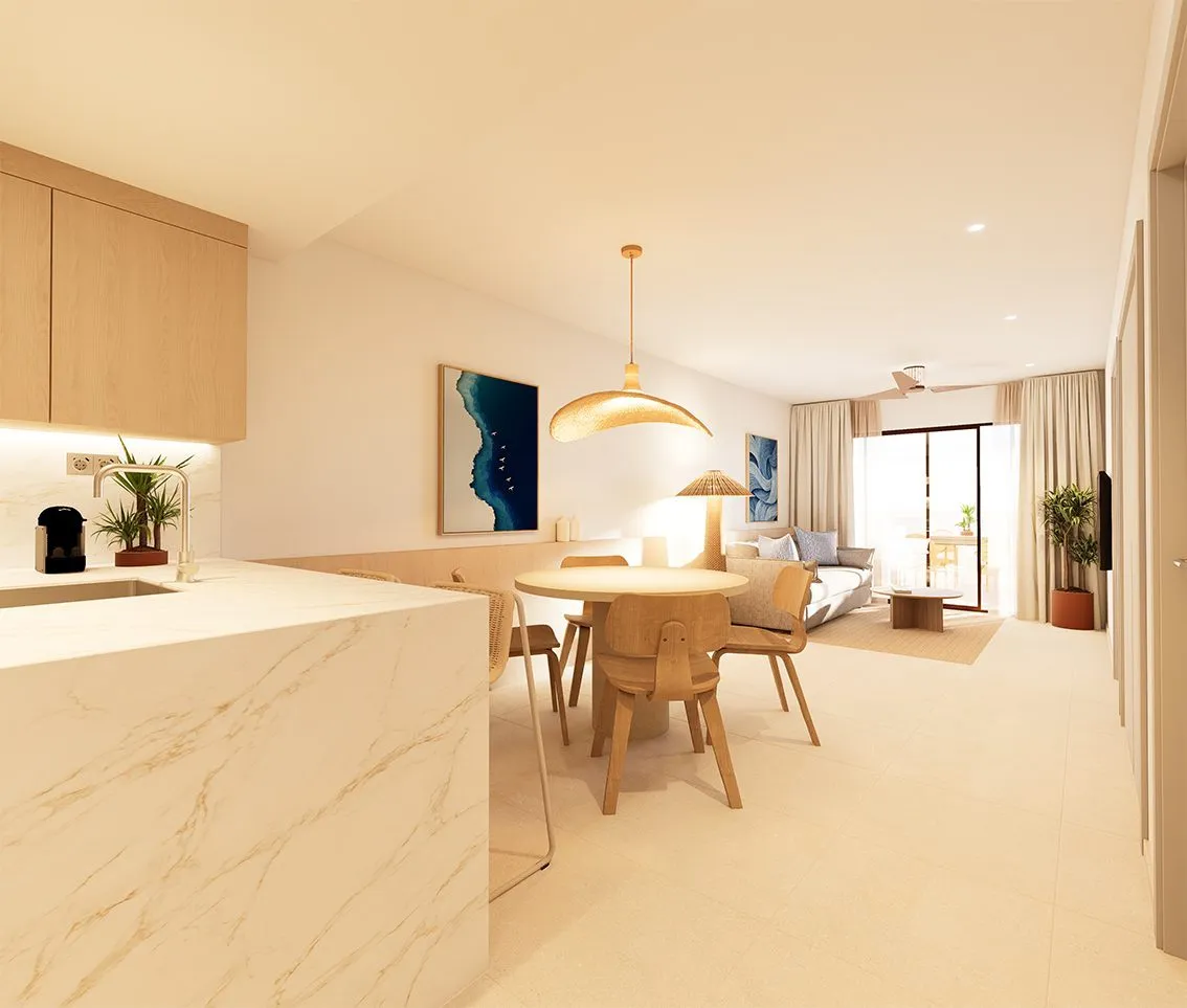 Render of an apartment interior: a kitchen with a marble-effect worktop, a round dining table and the living area by the terrace beyond