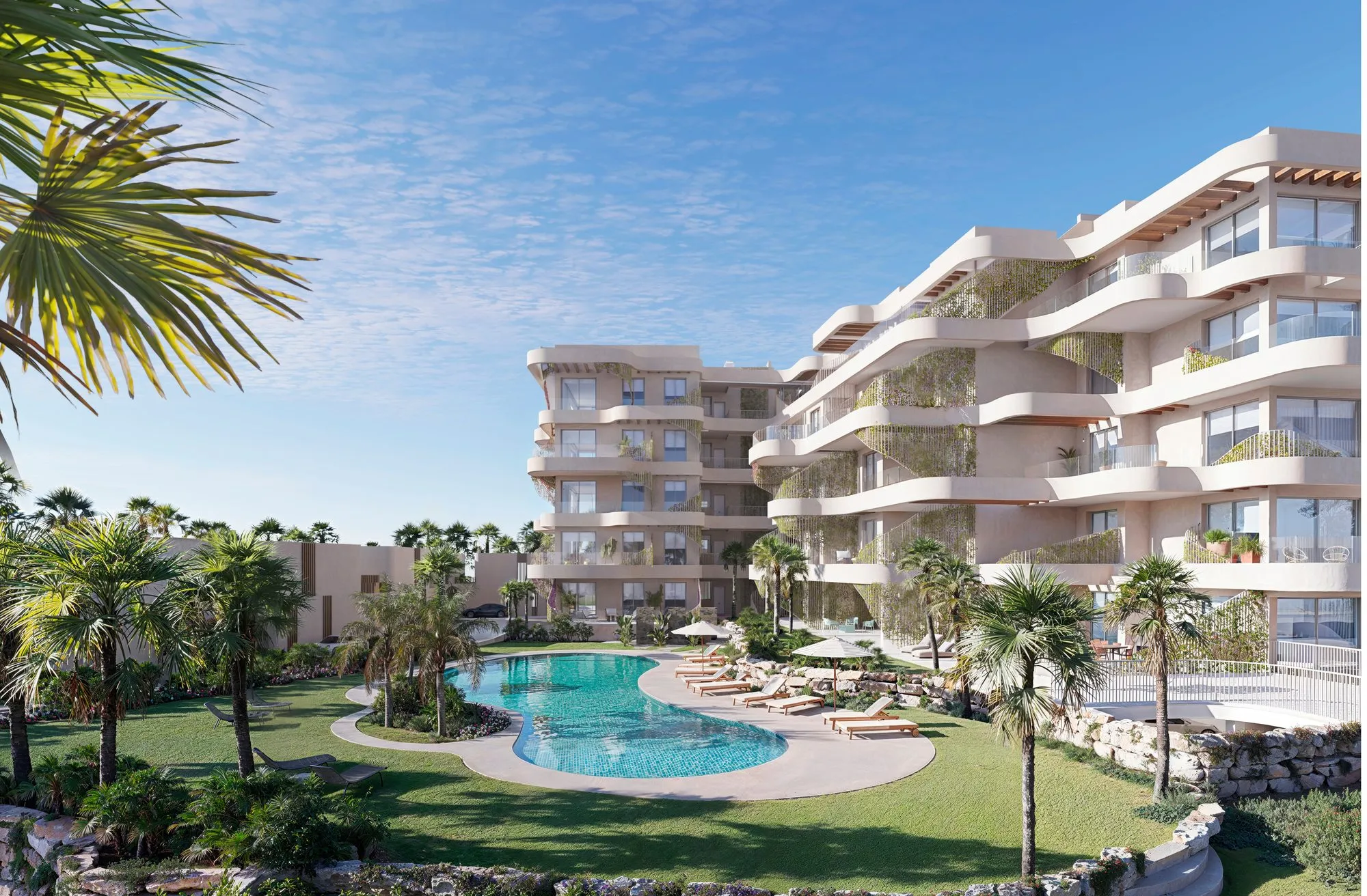 Render of the Palmwave apartment blocks, with curving white terraces, behind a large communal pool with sun loungers, lawn, palm trees and a rockery