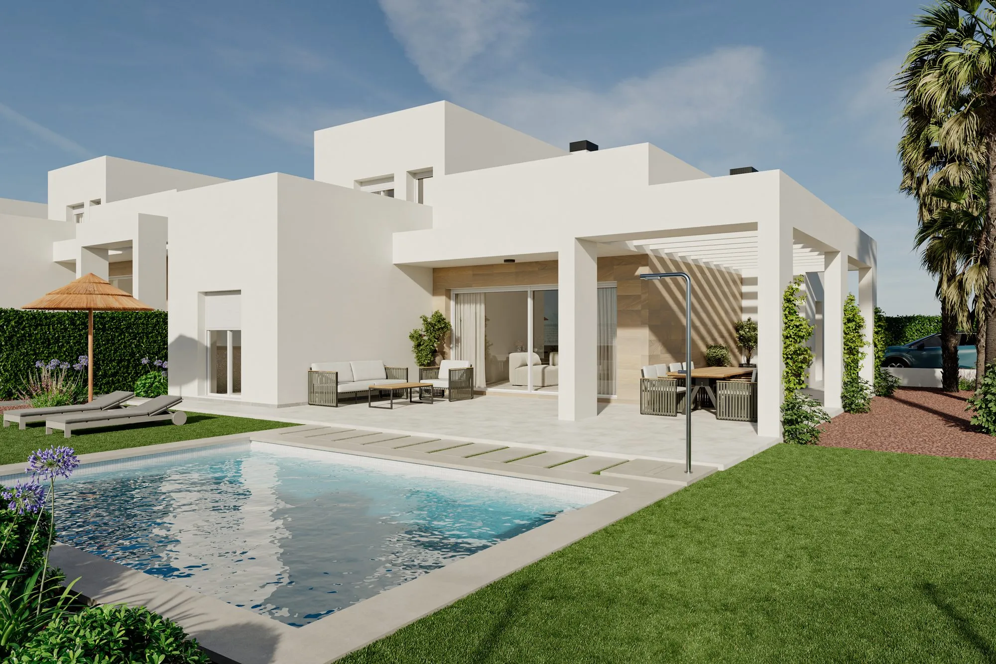 Render of a THASOS villa: a private pool, a lawn and a covered porch with sofas and outdoor dining beside the white façade