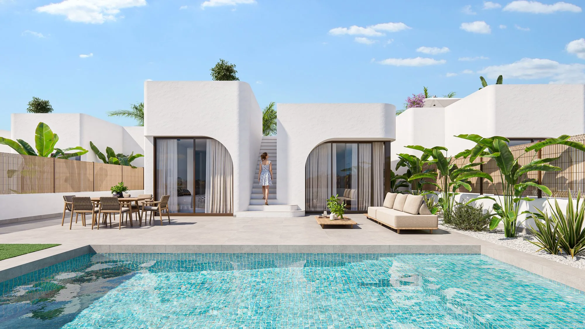 Impressie van een witte villa met ronde vormen, privézwembad en terras